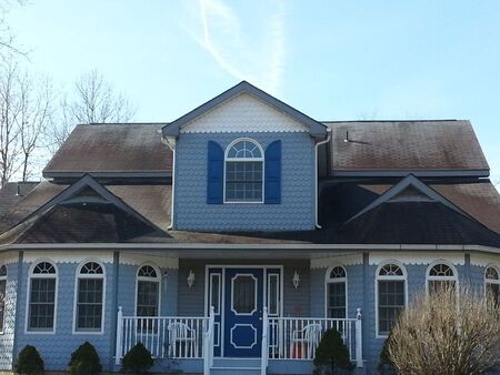 Soft wash roof cleaning vs pressure washing asphalt shingles